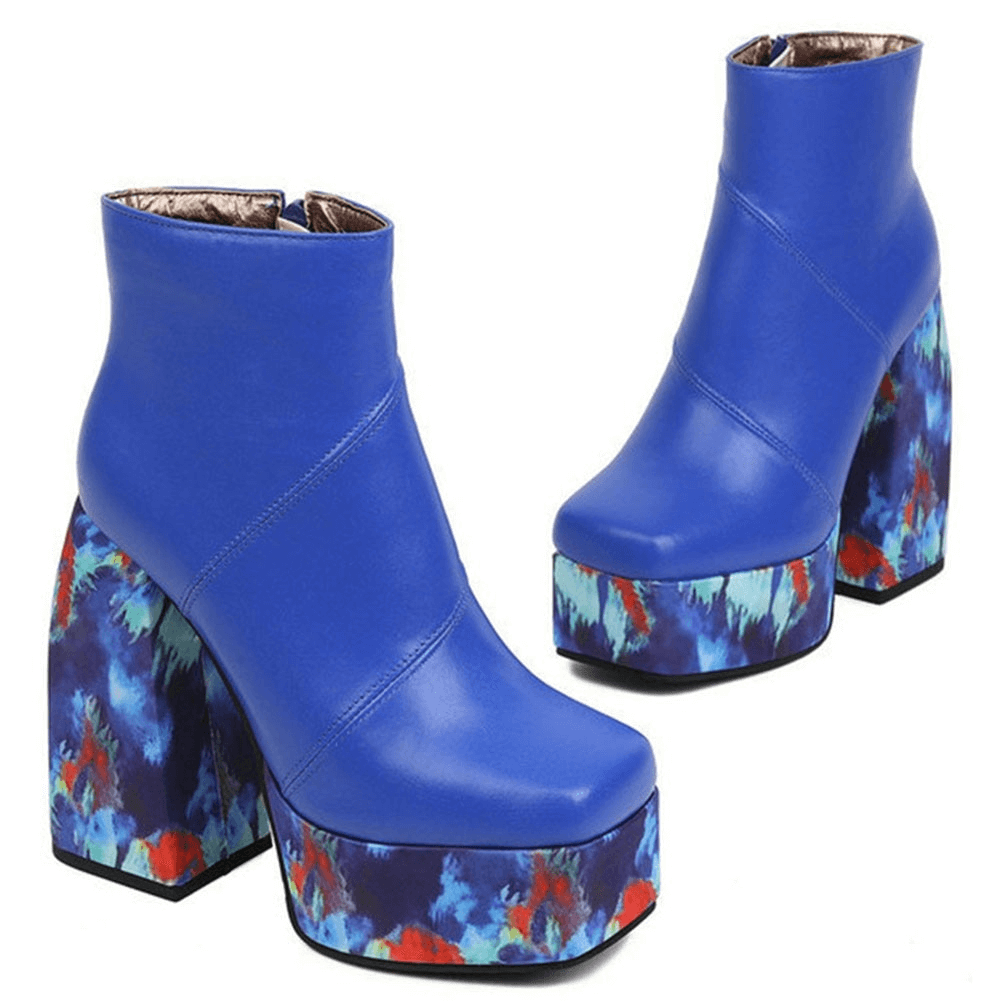 Stylish blue platform square toe boots with patterned thick heels for women. Perfect for adding flair to any outfit.