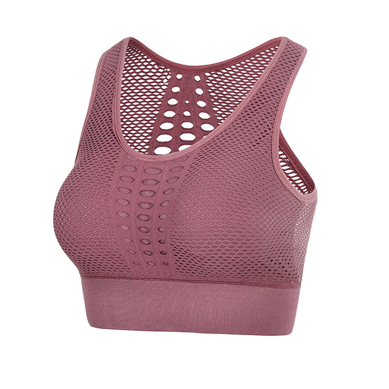 Breathable women's sports top in pink, perfect for workouts and summer fitness activities.