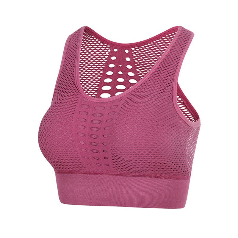 Lady's seamless breathable sports top in pink, perfect for summer fitness workouts and runs.