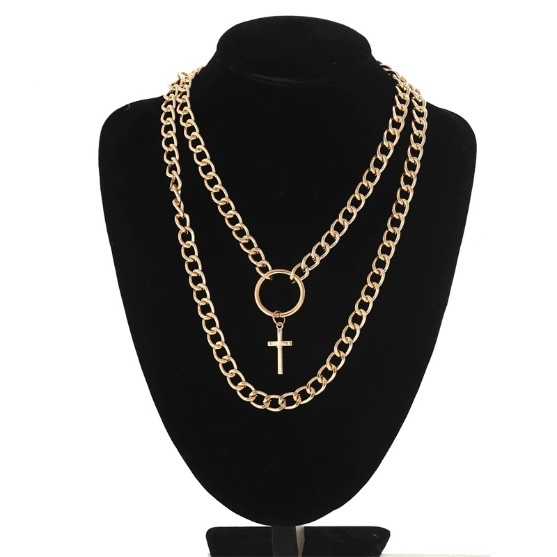 Stylish unisex layered gold chain necklace with cross pendant, perfect for punk and aesthetic fashion.