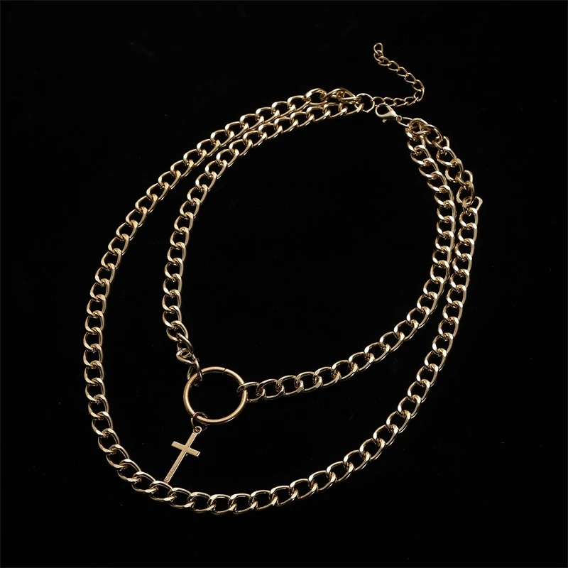 Layered gold chain necklace with cross pendant, unisex punk jewelry, perfect for a stylish aesthetic look.