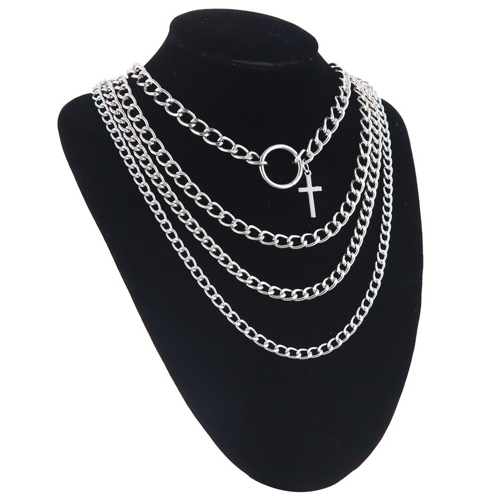 Layered chain choker necklace with cross and ring, unisex fashion accessory for stylish outfits.