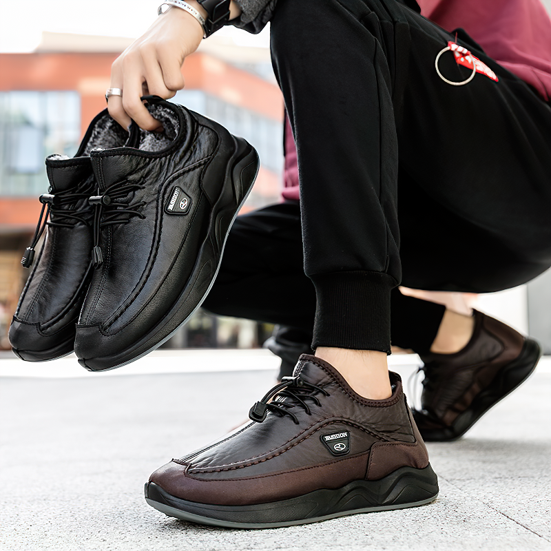 Men's waterproof leather alternative sneakers in black and brown, perfect for spring and fall fashion.