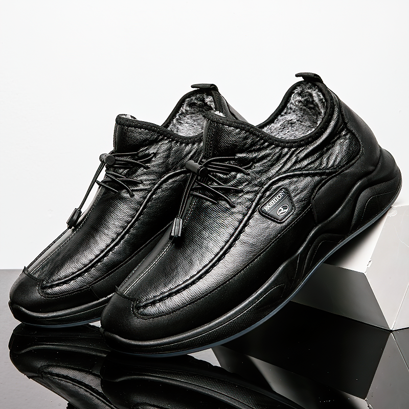 Stylish black leather alternative sneakers for men with plush lining and dense sole, perfect for spring and fall.