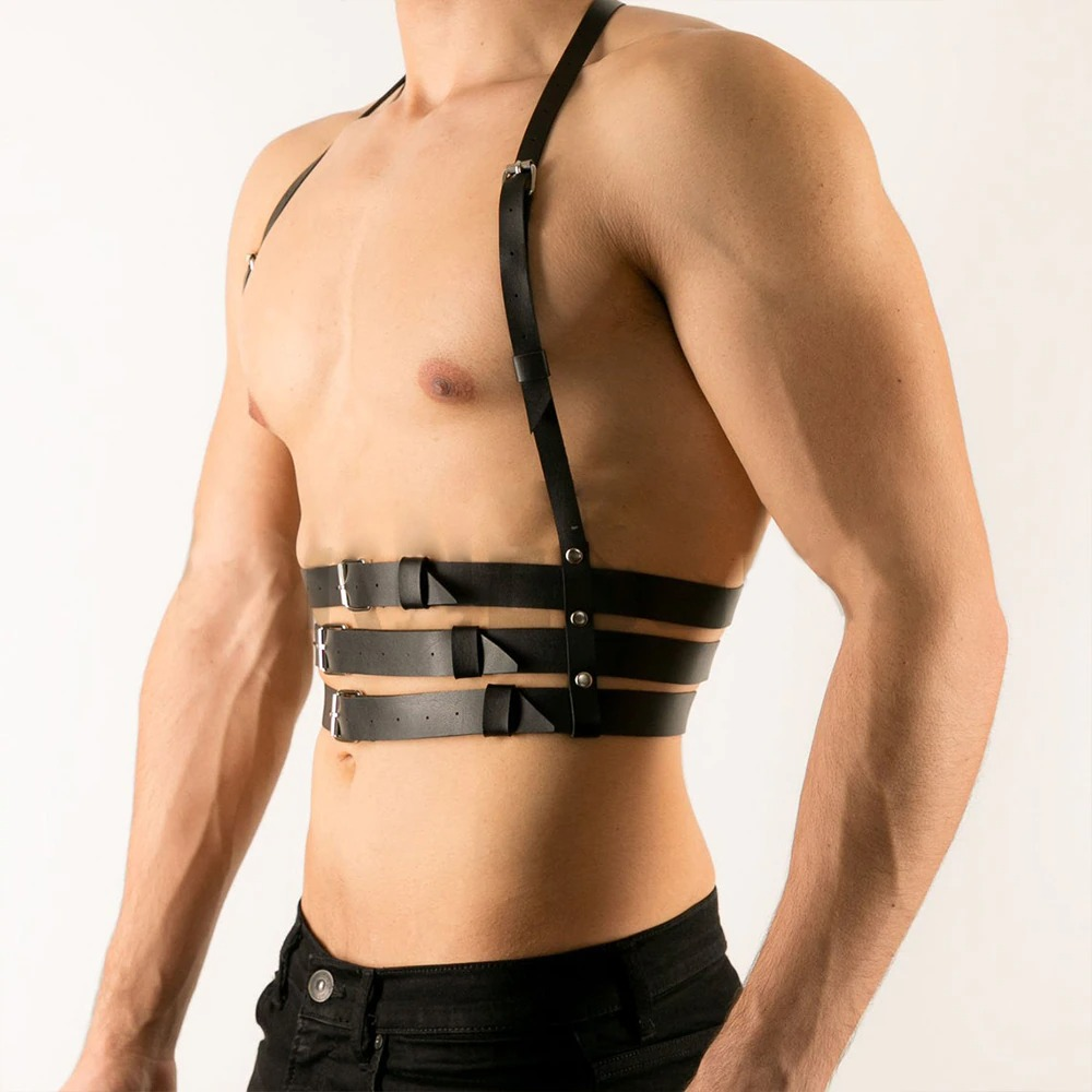 Men's adjustable leather body harness in black, featuring stylish silver fittings for an erotic punk rave look.