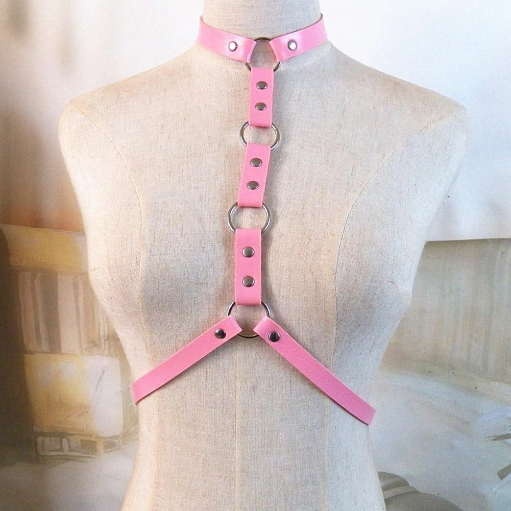 Pink gothic leather body harness with choker and rings for women, perfect for cosplay and festival outfits.