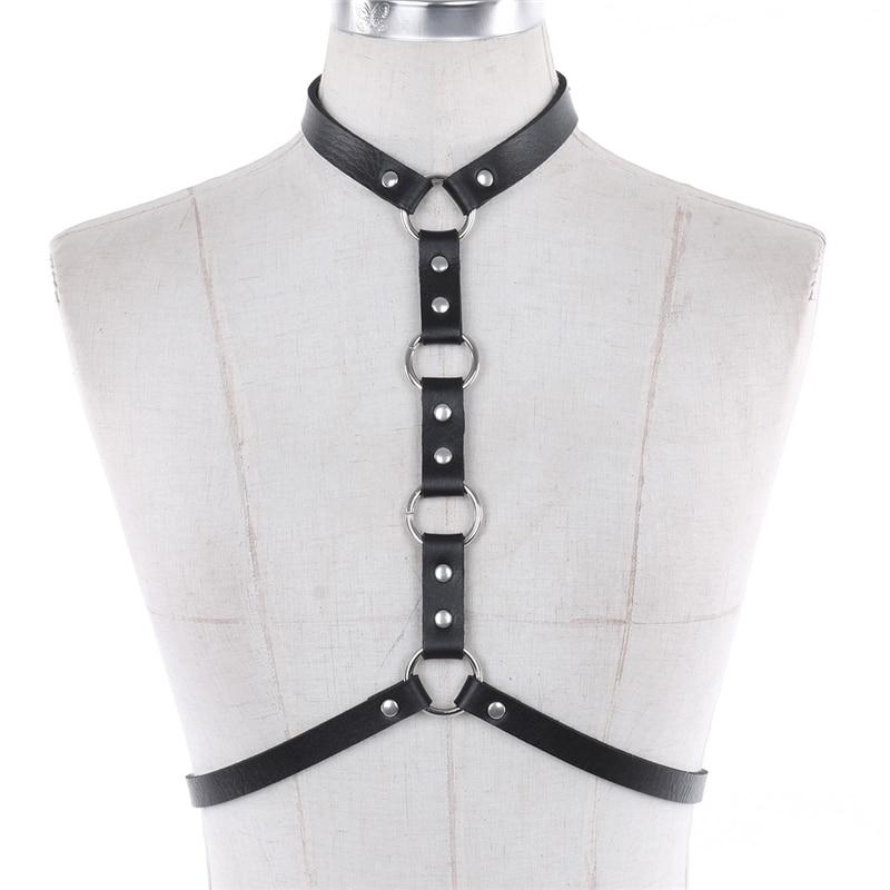 Gothic leather body harness for women with rings and rivets, perfect for cosplay and festival outfits.