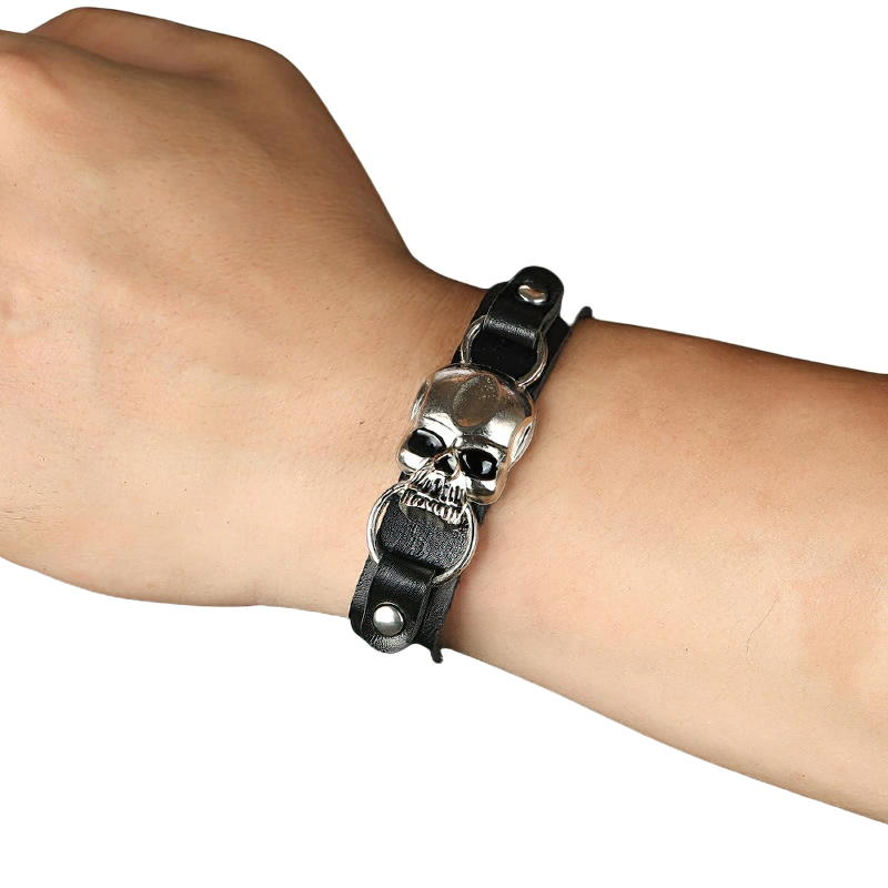Stylish black leather bracelet with a silver skull, perfect gothic accessory for men and women.