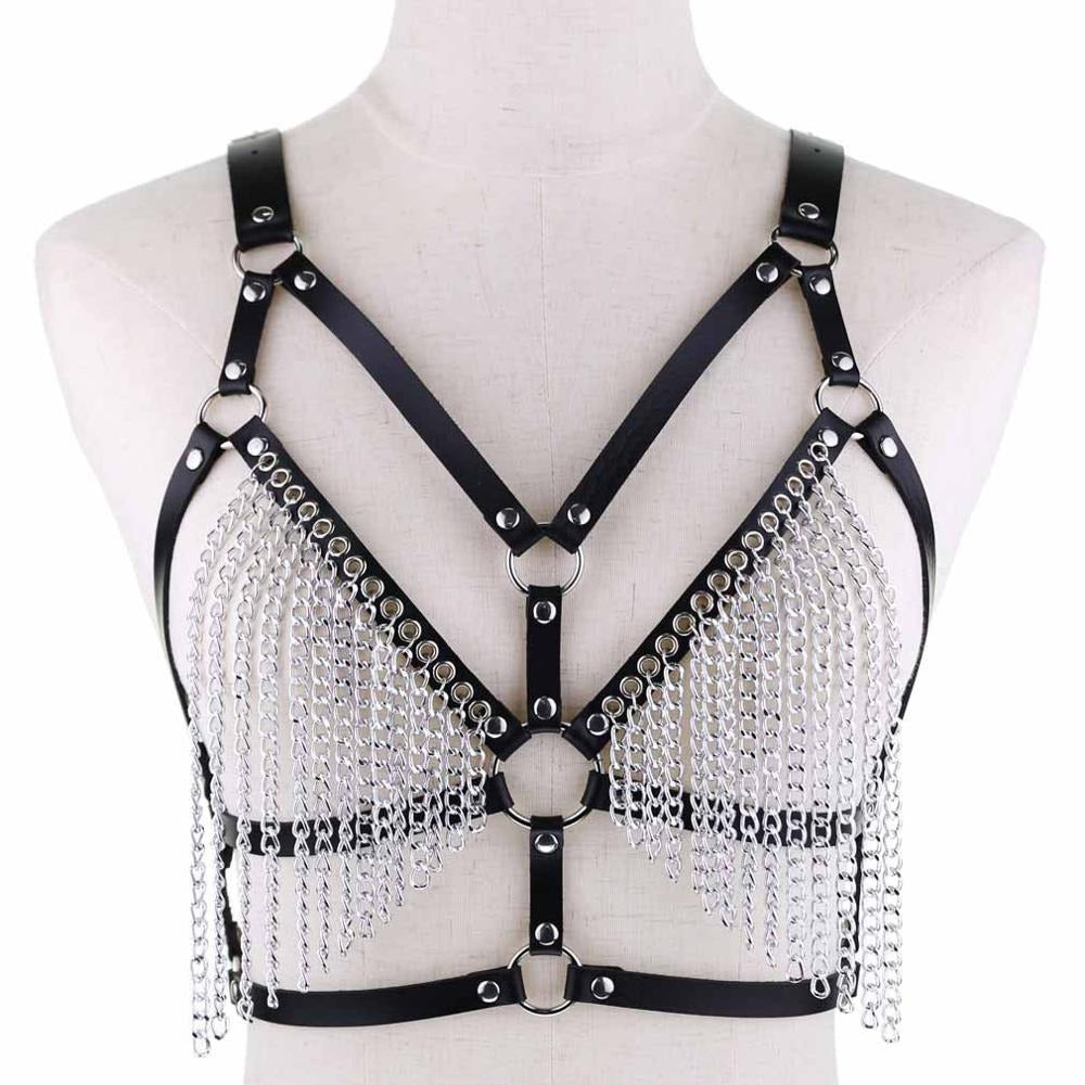 Stylish women's faux leather chain body harness with metal accents, perfect for gothic and rave outfits.