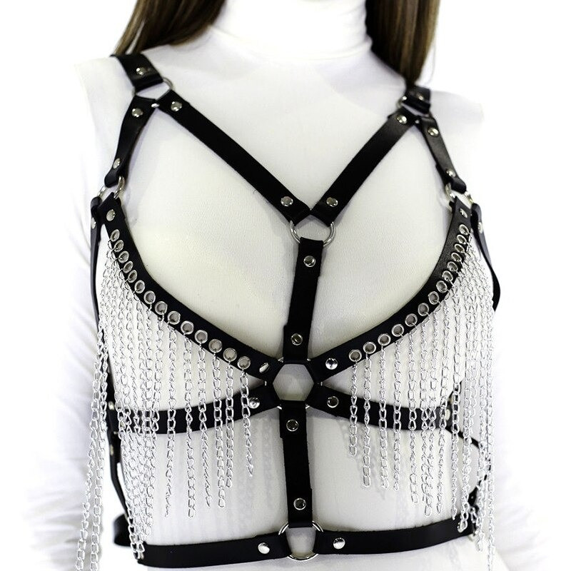 Women's gothic chain body harness made of faux leather with adjustable straps and metal chains, perfect for rave outfits.