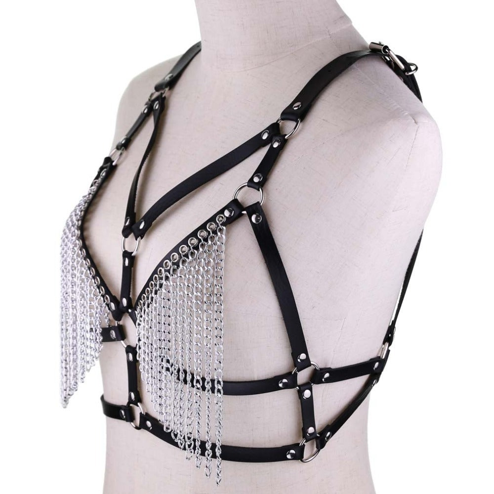 Women's gothic leather chain body harness with silver chains, adjustable fit for bold rave outfits.