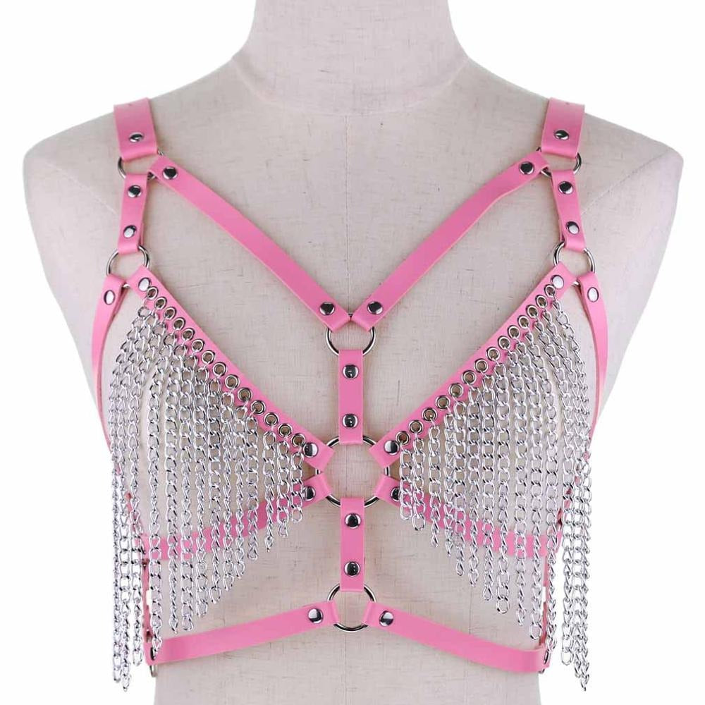 Adjustable pink leather chain body harness with metallic fringe for bold gothic rave outfits.