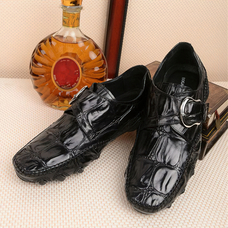 Stylish black leather crocodile pattern loafers for men with trendy buckle detail, perfect for casual and formal occasions.