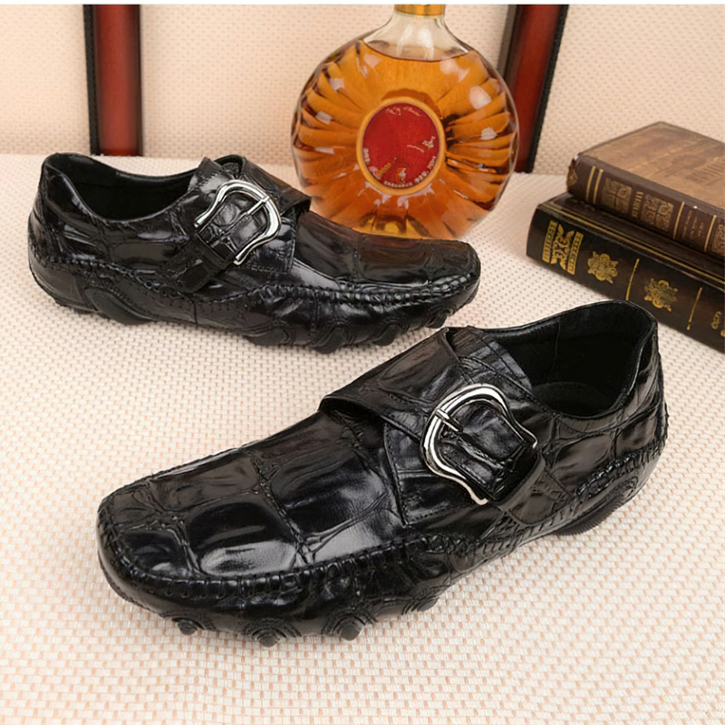Black leather crocodile pattern loafers with trendy buckle for men - casual and stylish footwear.