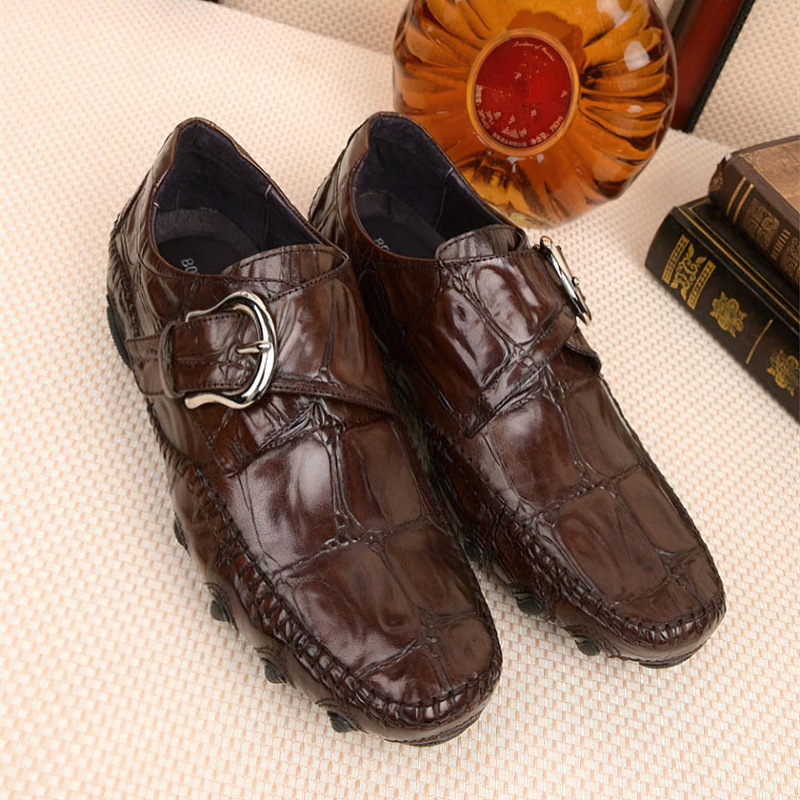 Stylish leather crocodile pattern loafers with trendy buckle, perfect for casual or formal wear.