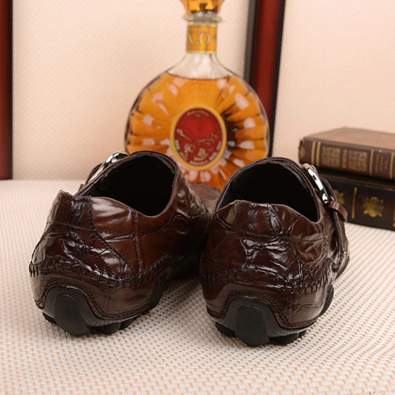 Stylish back view of brown leather crocodile pattern men's loafers with trendy buckle, perfect for casual outings.