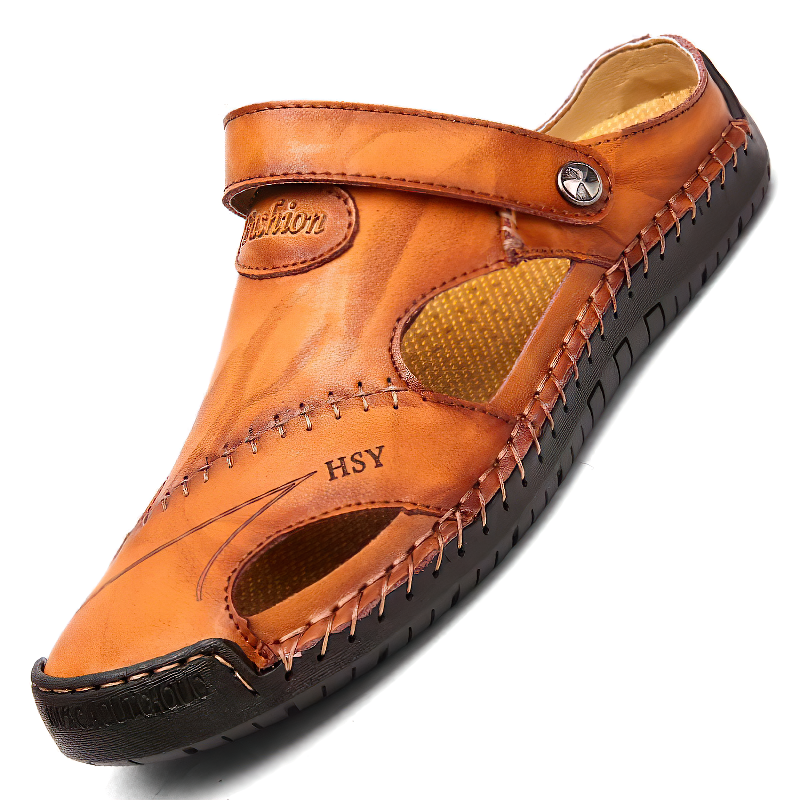 Genuine leather men's soft sandals in tan, featuring stylish cutouts and comfortable design for summer beach wear.