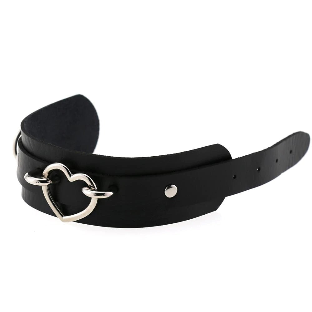 Black leather cuff bracelet with heart charm, perfect for a stylish unisexual accessory.