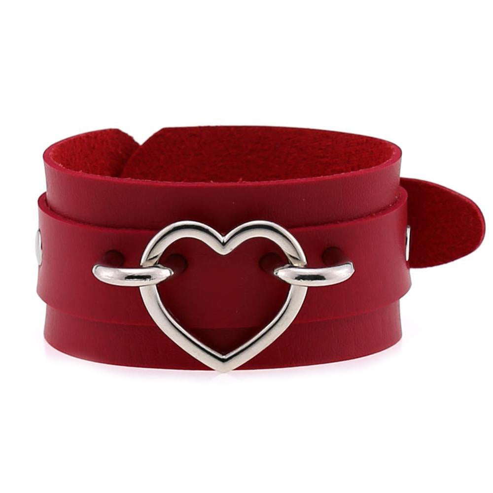 Red leather wristband cuff bracelet with heart charm, stylish unisex fashion accessory.