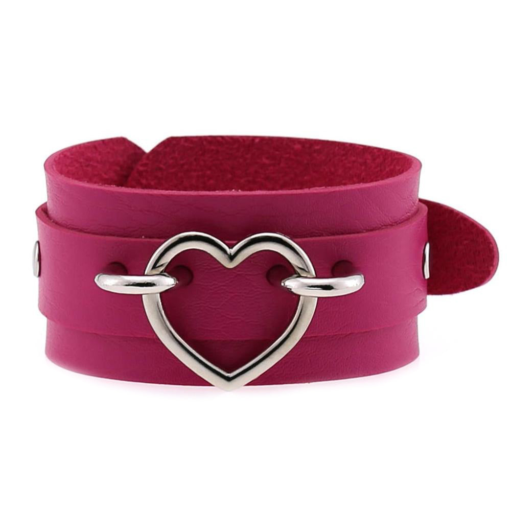 Pink leather cuff bracelet with a silver heart, unisex emo fashion accessory for men and women.