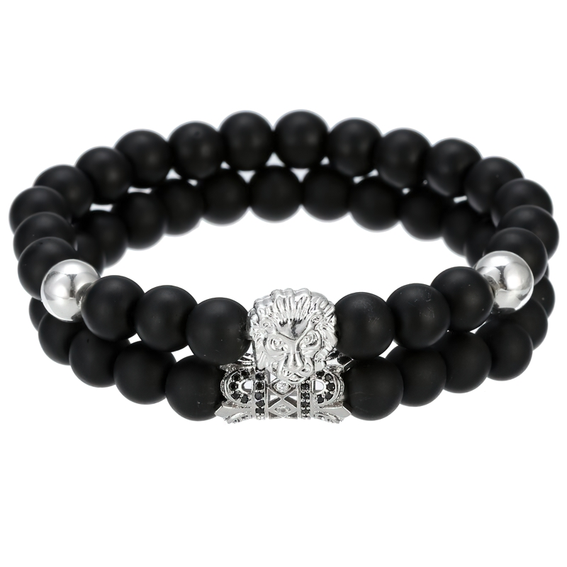 Unisex lion bracelet with stone beads, featuring a lion head and crown in stylish alternative fashion.