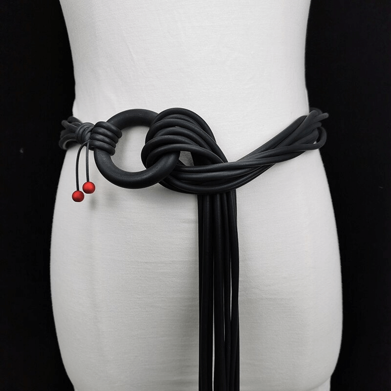 Handmade gothic black rubber belt with red beads, perfect accessory for any stylish outfit.
