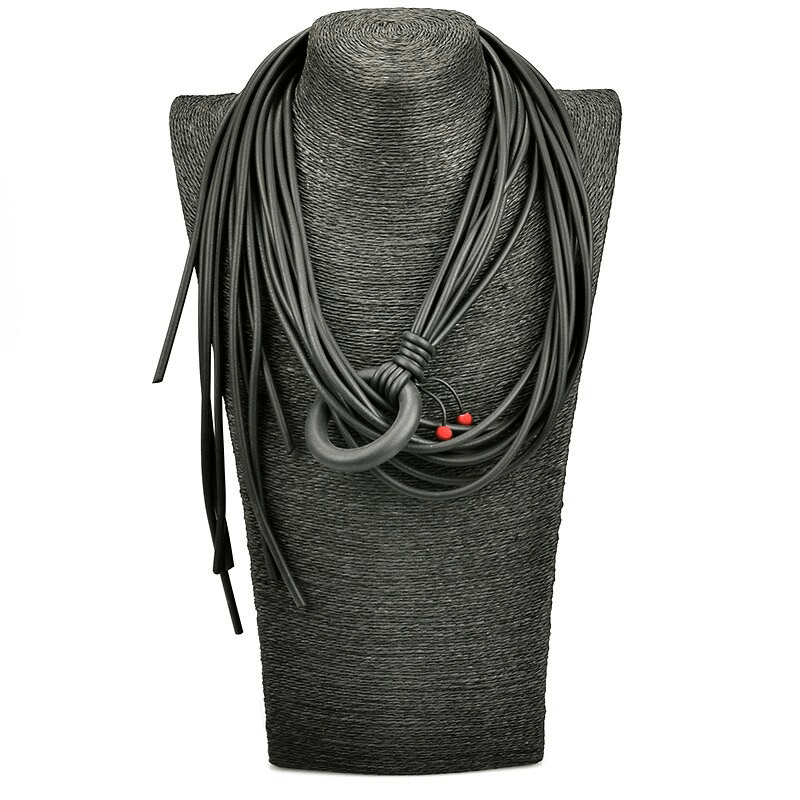 Long adjustable gothic necklace for women with red beads and rubber cord accessories.