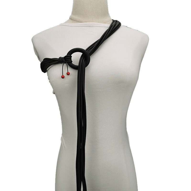 Long adjustable gothic necklace for women featuring black rubber and red beads, perfect for stylish outfits.