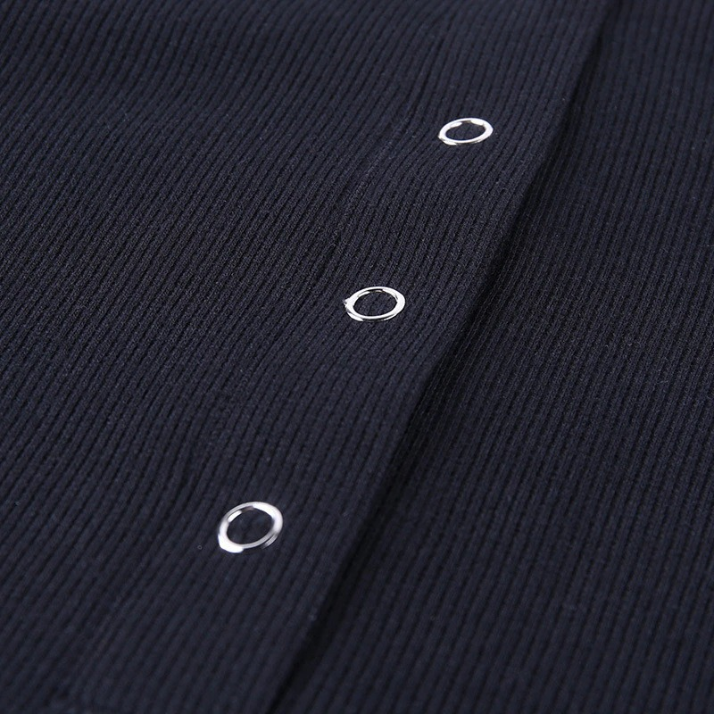Close-up of buttons on a long sleeve ribbed women bodysuit, showcasing a sexy and elegant design.