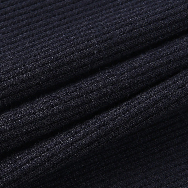 Close-up view of a dark ribbed fabric, perfect for a women's sexy bodycon bodysuit or jumpsuit.