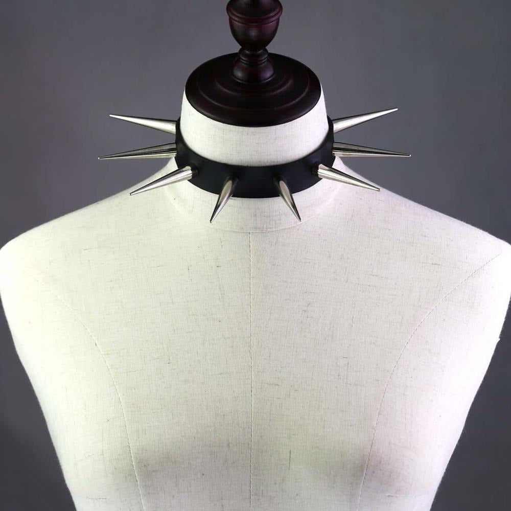 Long spiked punk choker collar displayed on mannequin, perfect goth jewelry for alternative fashion lovers.