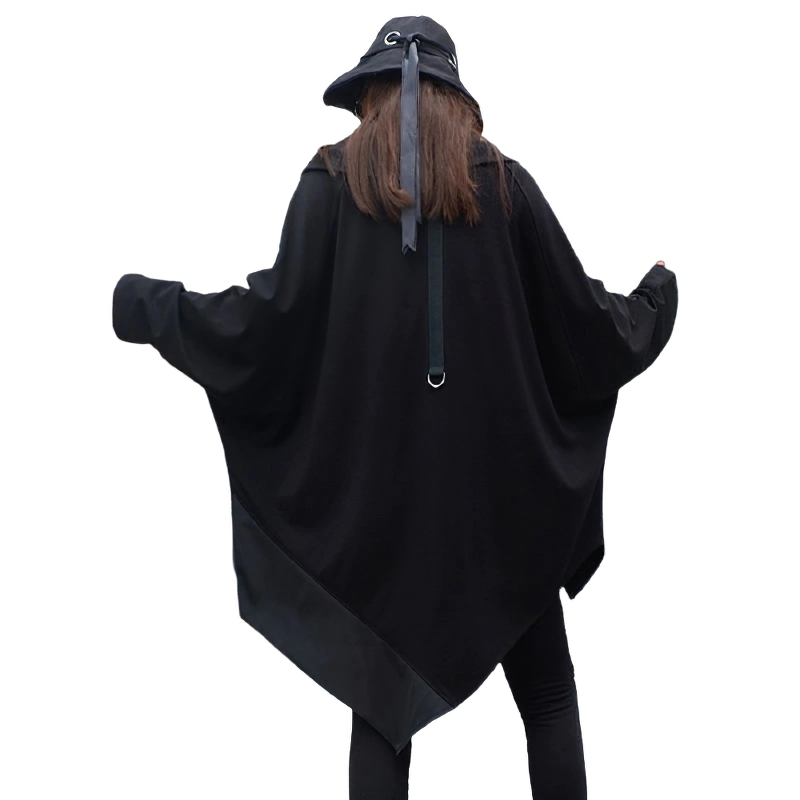 Loose fit oversized asymmetrical black sweatshirt with unique cut, featuring stylish silver chains and a trendy look.