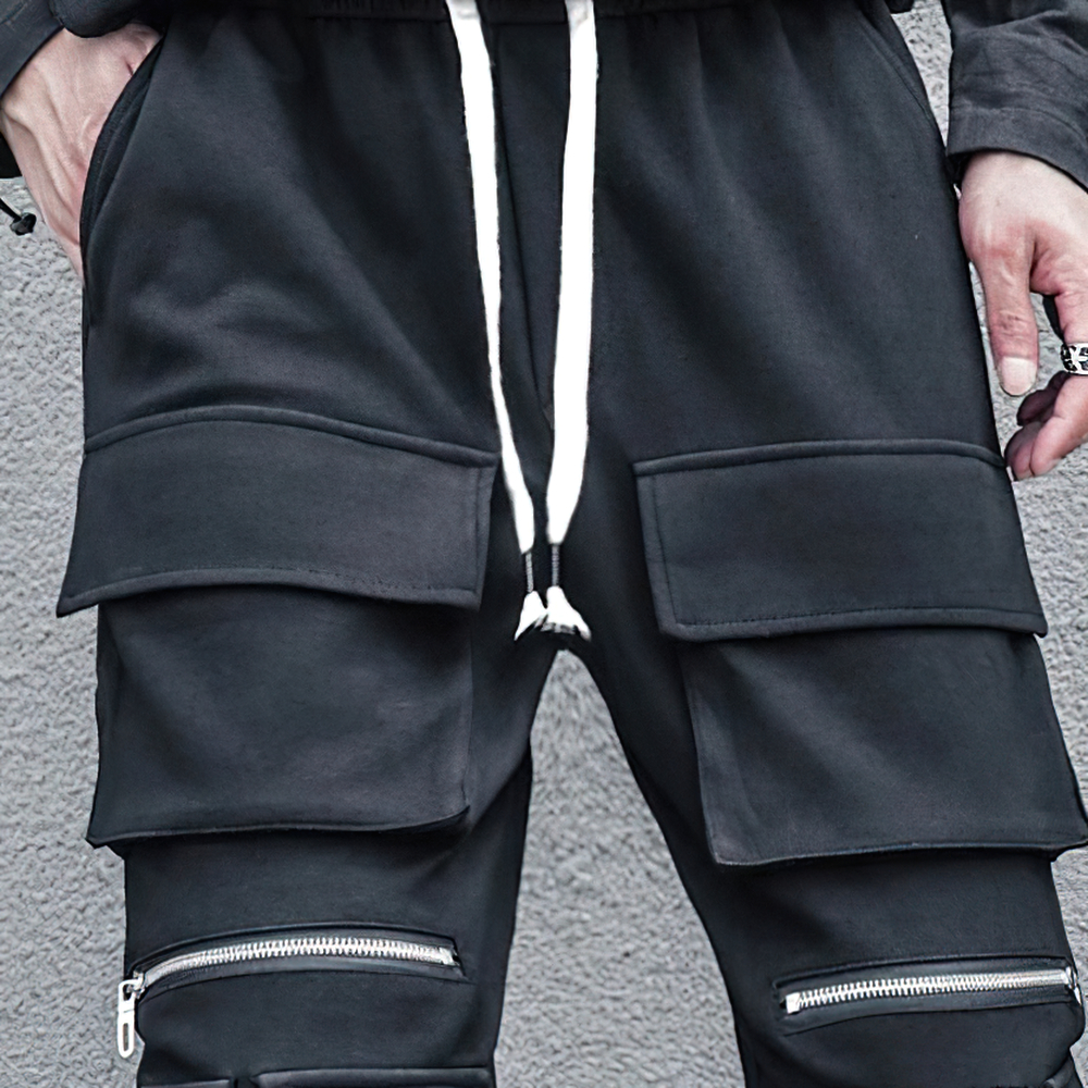 Loose men's black pants with multi-pockets and elastic waist, stylish and comfy for casual wear.