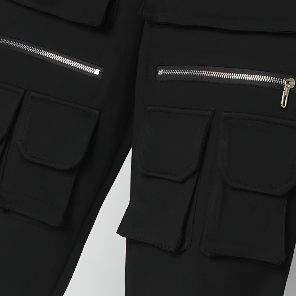 Close-up of men's black multi-pocket pants featuring zippers and an elastic waist for comfort in casual style.
