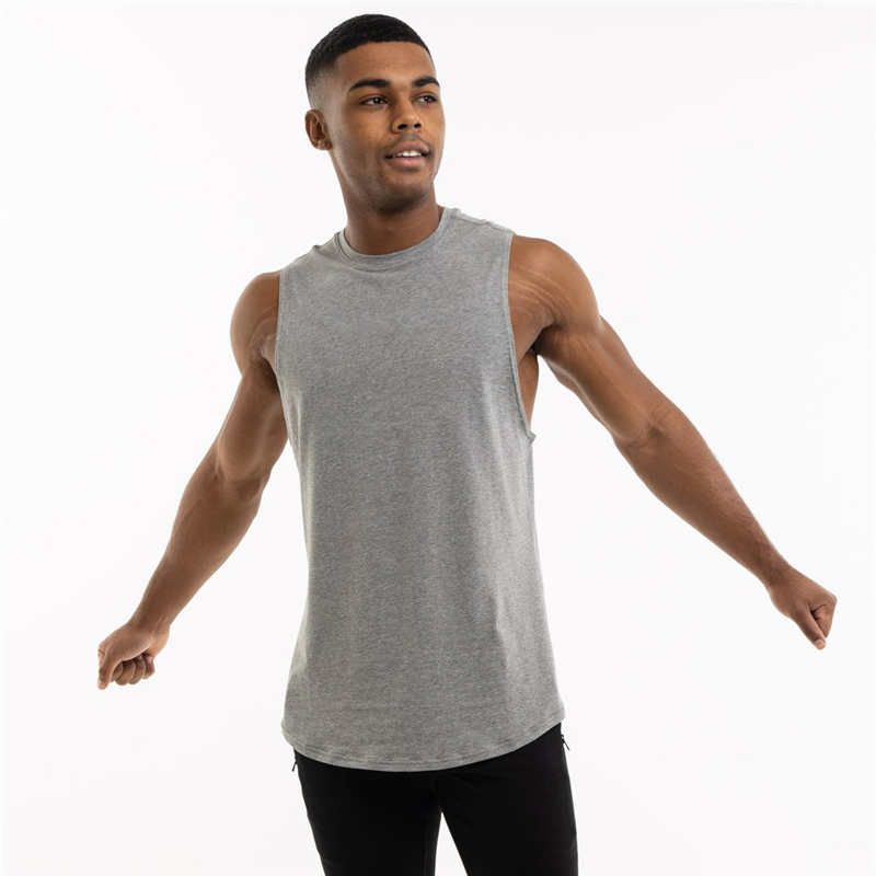 Stylish loose sleeveless grey cotton tank top for men, ideal for alternative gym wear, showcasing a straight cut and trendy design.