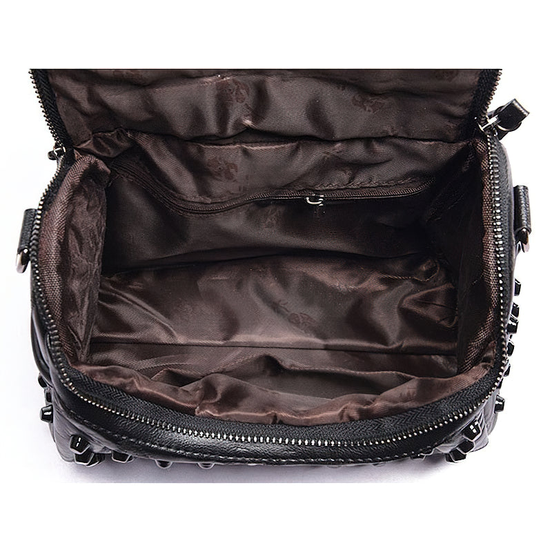 Interior view of the luxury black women's sheepskin messenger bag with multiple pockets and a sleek design.