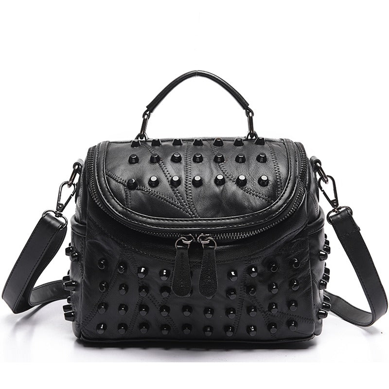 Luxury black women's sheepskin bag with rivets, perfect for daily outings and nights out, featuring a stylish design and ample pockets.