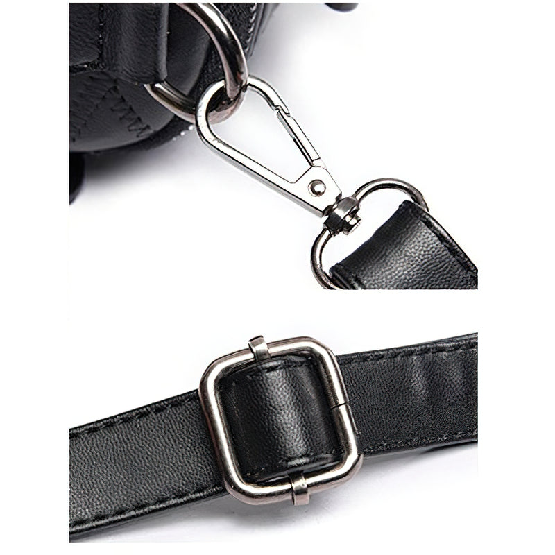 Close-up of luxury black women's sheepskin bag strap and metallic clips, highlighting durable design and style.