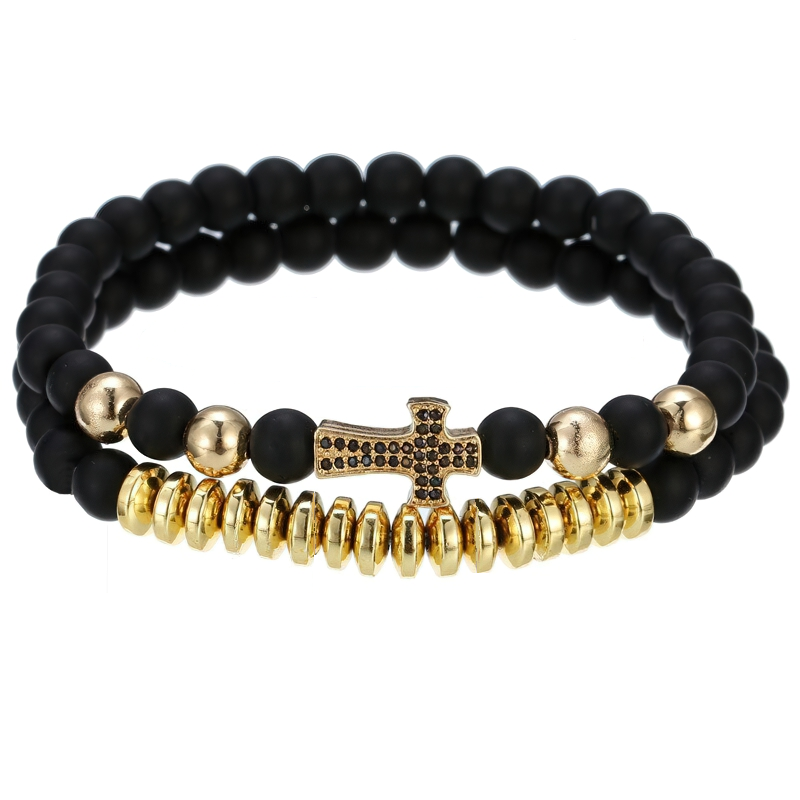 Unisex luxury bracelet featuring natural lava stone beads and a stylish cross, perfect for alternative fashion outfits.