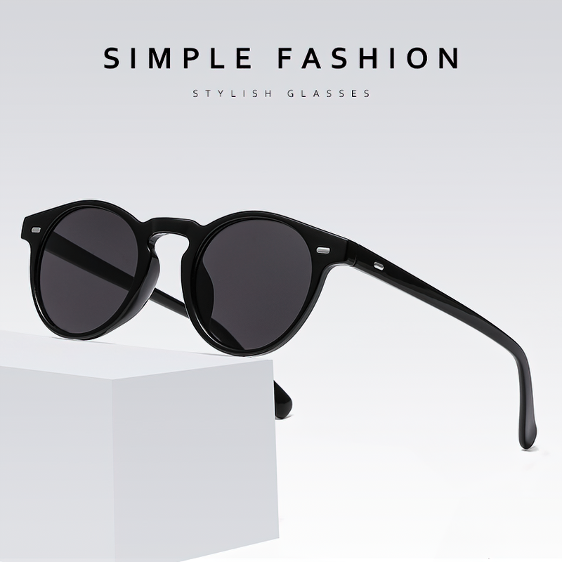 Stylish black sunglasses on display, showcasing a trendy retro design for men and women. Perfect accessory for casual outfits.