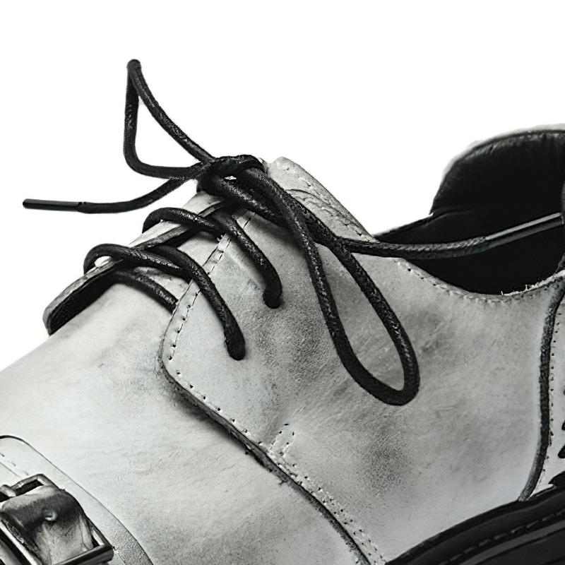 Close-up of luxury men's genuine leather casual shoes with stylish laces and platform soles.