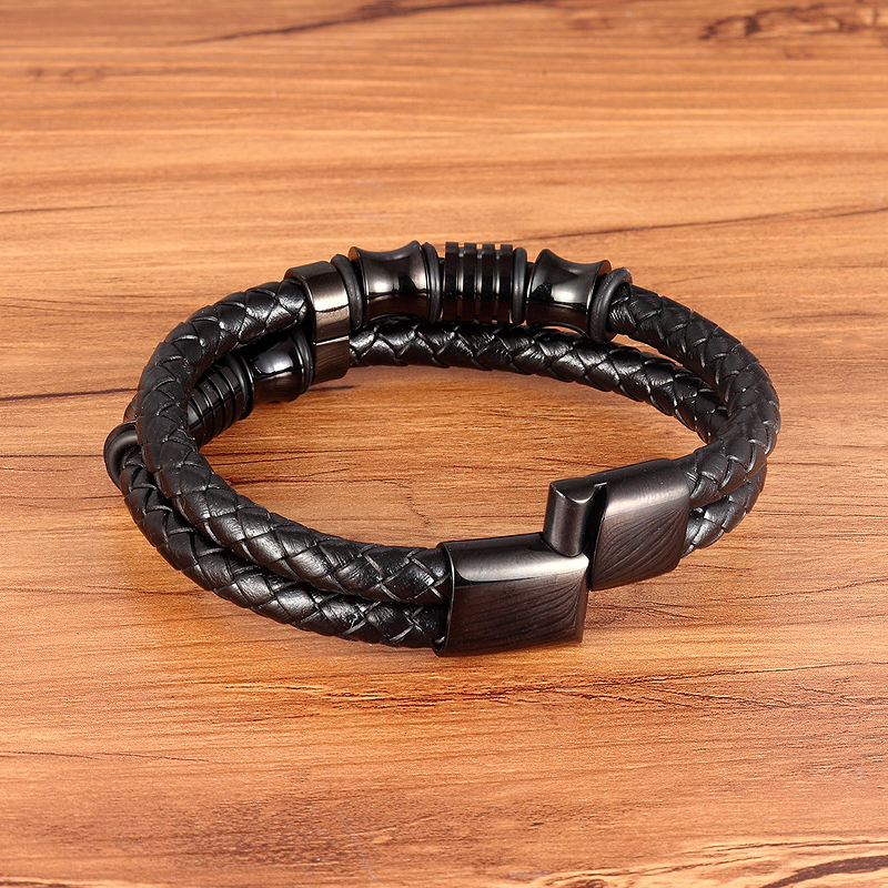 Luxury men's bracelet featuring genuine leather and stainless steel, ideal for trendy and rock style outfits.