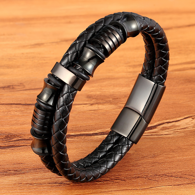 Luxury men's bracelet featuring genuine leather and stainless steel in a trendy rope chain design.