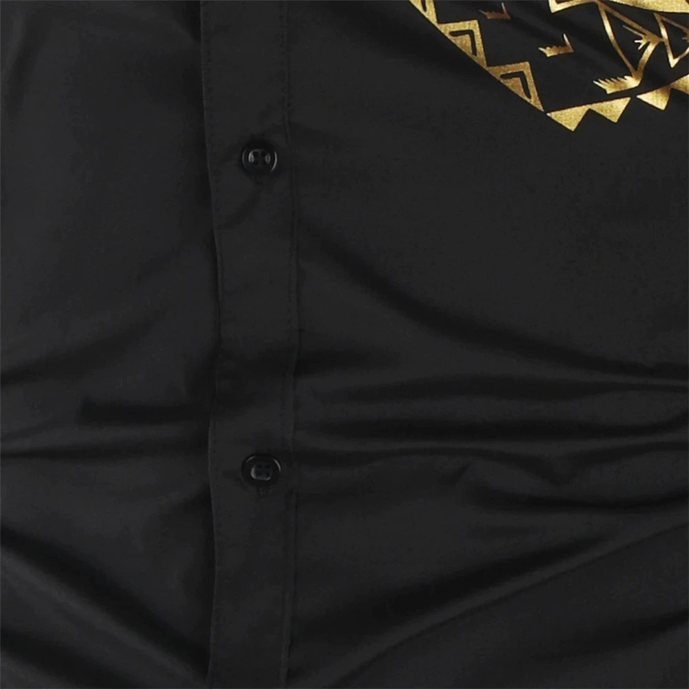 Luxury men's shirt with gold print details, showcasing a sleek casual style and breathable fabric.