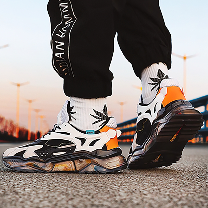 Men's luxury breathable running sneakers in black and orange, non-slip and stylish for casual wear.