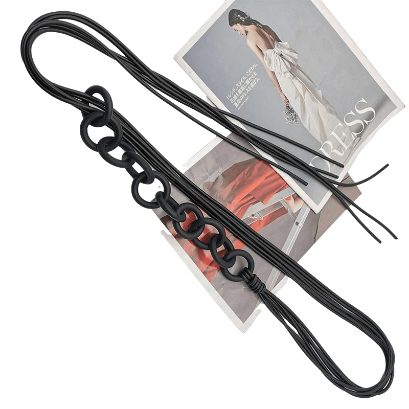 Stylish long black rubber necklace showcasing handmade gothic design, perfect for women’s fashion accessories.