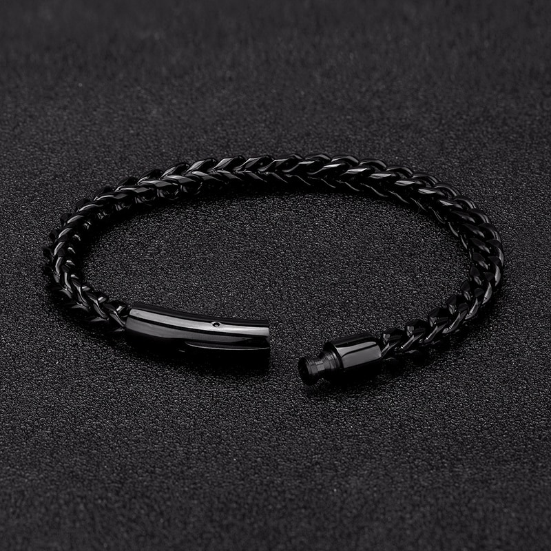 Black braided stainless steel bracelet for men in punk rock style, featuring a secure lock.