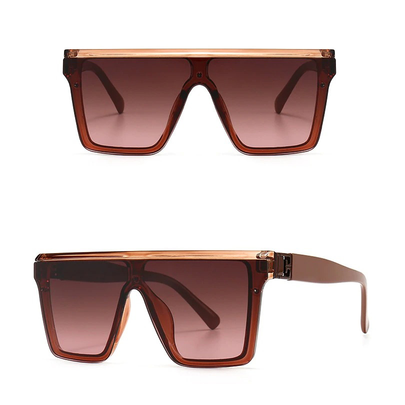 Oversized square vintage sunglasses with brown resin frame, stylish accessory for any outfit.