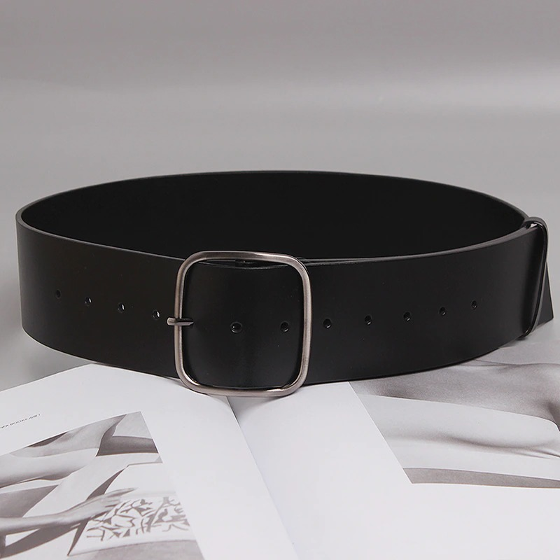 Luxury wide black belt for women, genuine leather with metal buckle, perfect for any outfit.