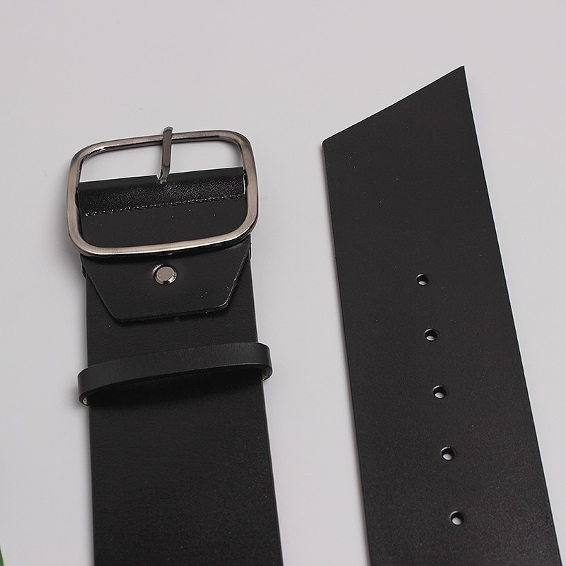 Luxury wide black leather belt for women with metal buckle, perfect for pairing with various outfits.